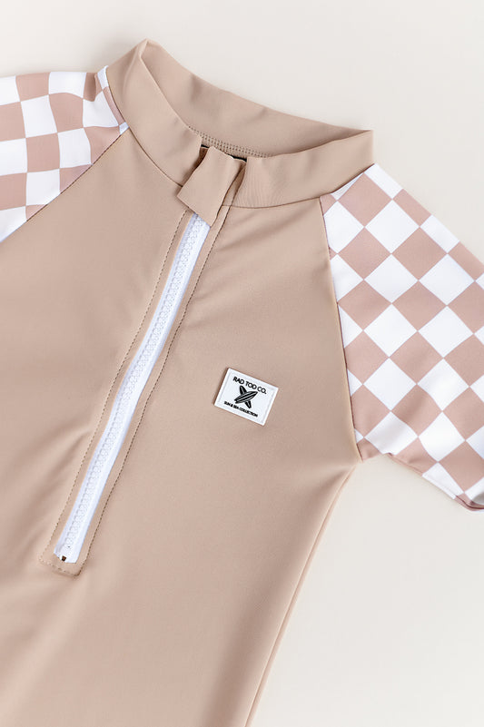 UPF 50 RASHGUARD ONESIE - DUNE CHECKERS