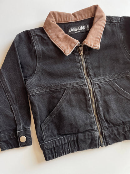 Black denim utility jacket with brown collar for kids.