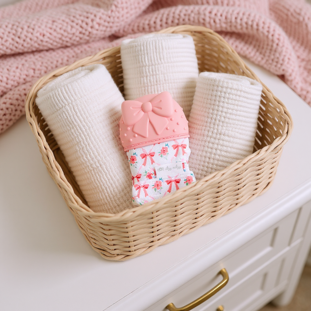 Itzy Mitt Silicone Teething Mitts: Bow
