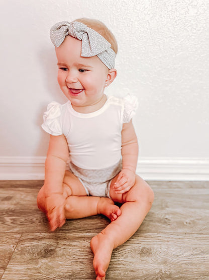 White Ruffle Bamboo Bodysuit